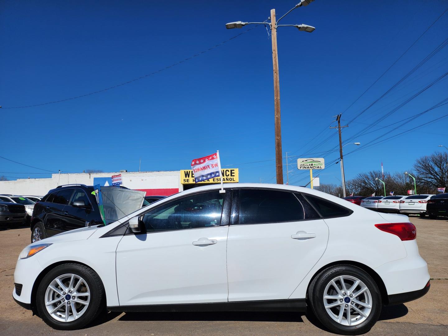 2016 WHITE Ford Focus SE (1FADP3F24GL) with an 2.0L L4 DOHC 16V engine, AUTO transmission, located at 2660 S.Garland Avenue, Garland, TX, 75041, (469) 298-3118, 32.885551, -96.655602 - Welcome to DallasAutos4Less, one of the Premier BUY HERE PAY HERE Dealers in the North Dallas Area. We specialize in financing to people with NO CREDIT or BAD CREDIT. We need proof of income, proof of residence, and a ID. Come buy your new car from us today!! This is a Super Clean 2016 FORD FOCUS - Photo#6